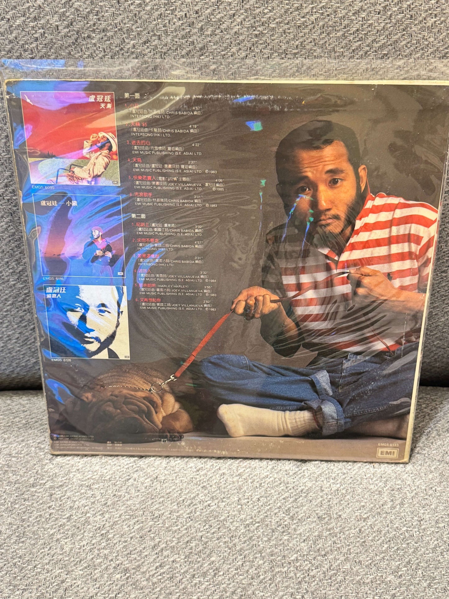 盧冠廷 – 第一階段 碟套背面展示,顯示曲目和封面設計,包含使用痕跡。